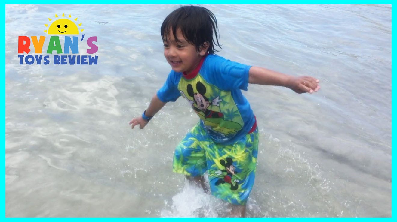 FAMILY FUN TRIP TO BEACH Ryan ToysReview playtime in the sand Kids Video