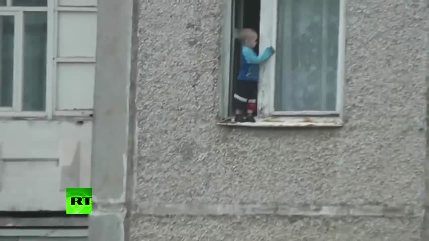 Nothing to see here: Toddler hangs from 8th fl window in Russia, safe