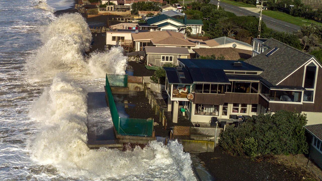 New Zealand High Tide Crashes Into Houses