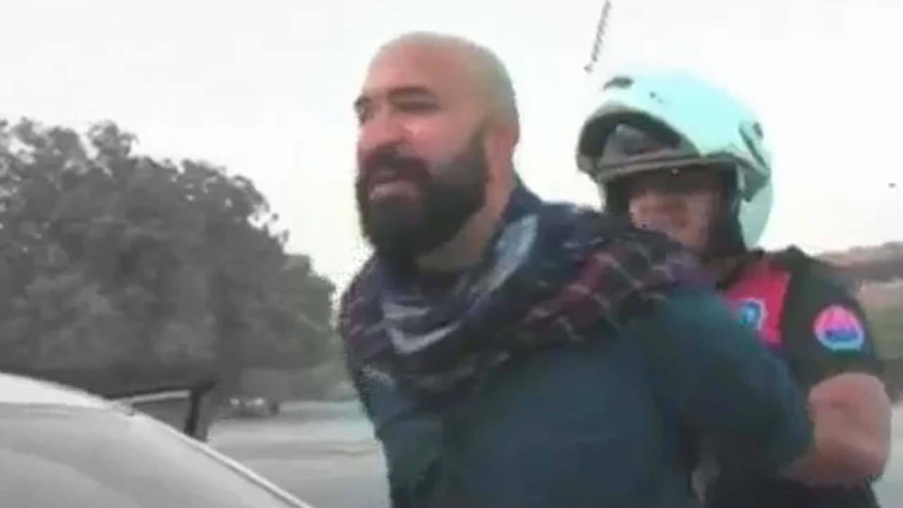 Dolphin force Pinning Wajahat Khan On The Car Bonnet After He Resists