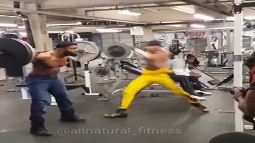 Guy gets kicked while deadlifting