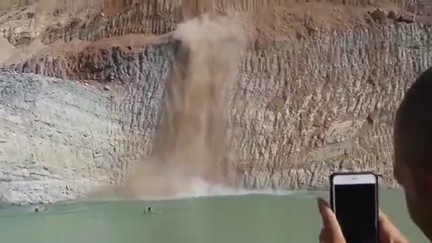Cliff jump interrupted with earthquake and falling rocks